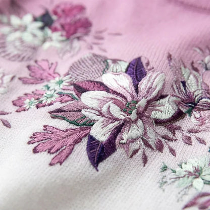 Aurora | Pull fleuri à col montant